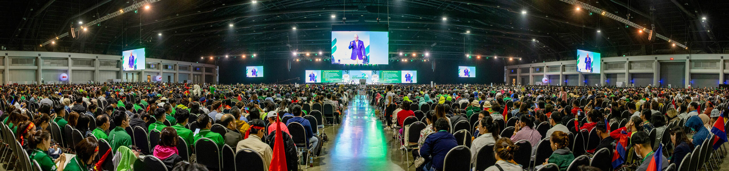 Event photographer in Thailand at a convention with attendees scaled.jpg